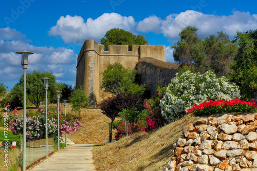 Historical Fortress Wall Pathway Lined with Colorful Flowers, Southern Europe Tourist Attraction