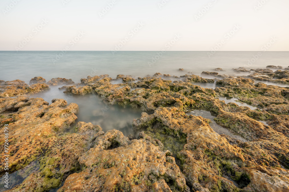 Long exposure nature landscape rocks by water Florida Keys