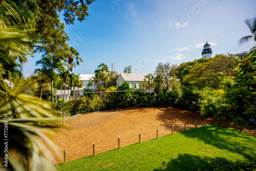 View of the lighthouse from Hemmingway Home Key West Florida photo