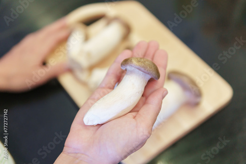Cooking Pleurotus eryngii. View of king oyster mushrooms © efired