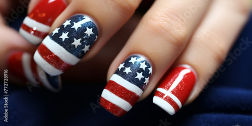 A patriotic manicure with a red white and blue design NailArt with blue background
 photo