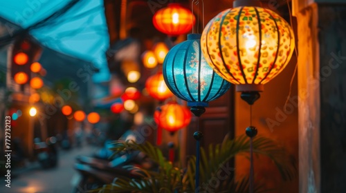 A row of traditional paper lanterns hanging on a pole, emitting a warm glow of light