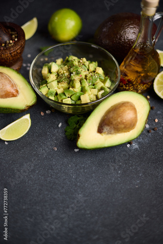 Chopped avocado in glass bowl and avocado Halves © Anatoly Repin