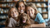 Portrait of young family couple with dog in petshop