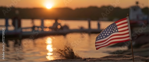 A small American flag stuck in the sand at a sunset, Independence Day, July 4th, flag, american flag, small flag, sand, sun, sun rays, blur, mountains, mountain, sky, river, ocean, sea