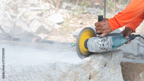 Workers are working, cutting marble cutter photo