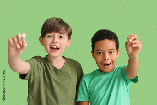 Little boys with chalk piec...