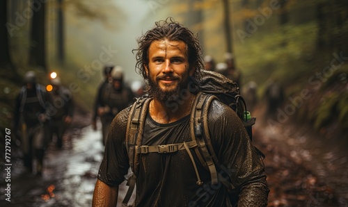 Man Backpacking Through Forest