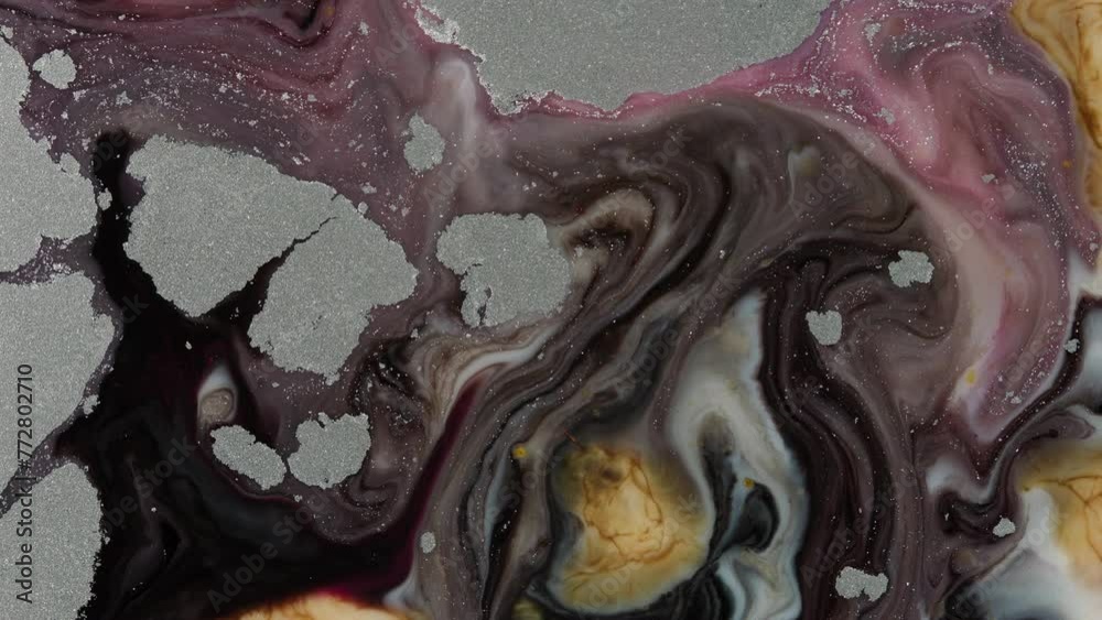Closeup motion video of rupture of fluid materials on boiling.