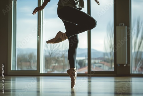 person in casual clothes practicing ballet positions photo