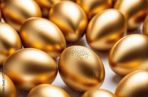 golden eggs on white background.