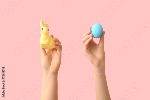 Hands holding a yellow east...