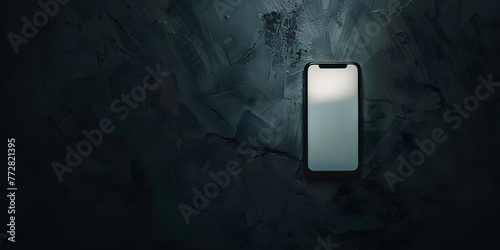Smartphone com tela brilhante em um fundo escuro