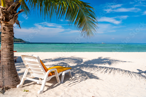 Fototapeta Naklejka Na Ścianę i Meble -  Empty beach chair with beautiful tropical white sand beach with transparent sea, Summer vacation and Travel concept