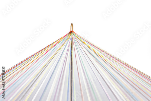 Rainbow Colored Threads Through Needle Eyelet on white background