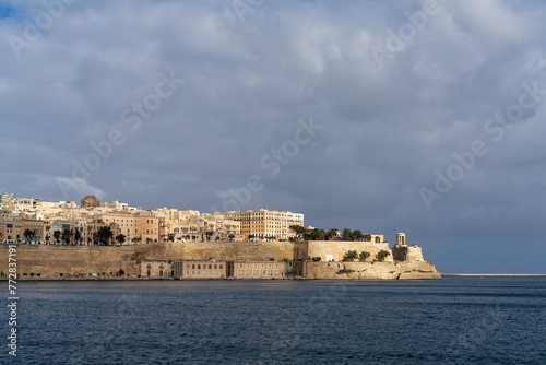 view of downtown Valletta and St. Elmo's Fire under an overcast sky