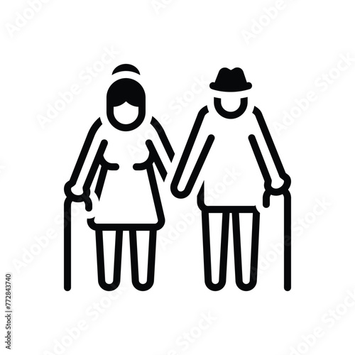Black solid icon for elderly couple