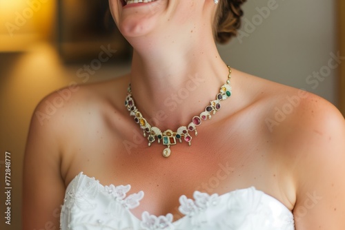 bride laughing, necklace with colored stones catches light