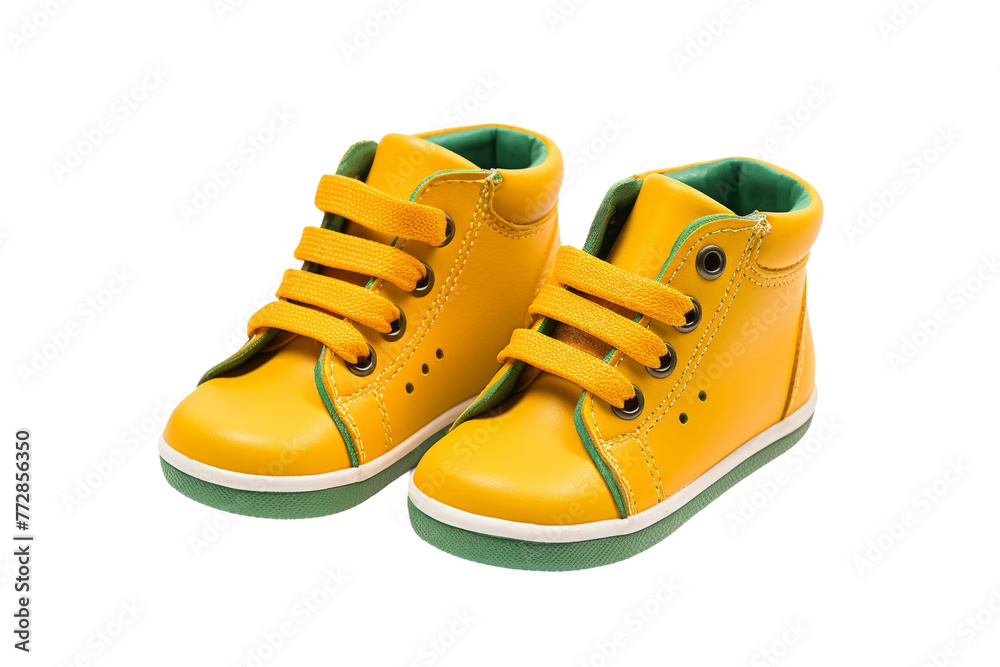 Pair of Yellow Shoes on White Background. On a White or Clear Surface PNG Transparent Background.. Pair of Yellow Shoes on White Background. On a White or Clear Surface PNG Transparent Background..