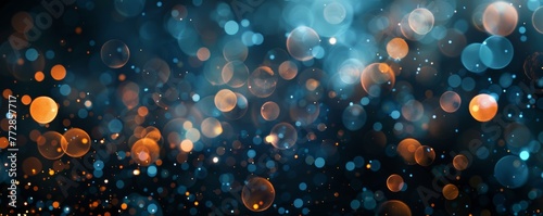 Abstract bokeh lights background in blue and orange