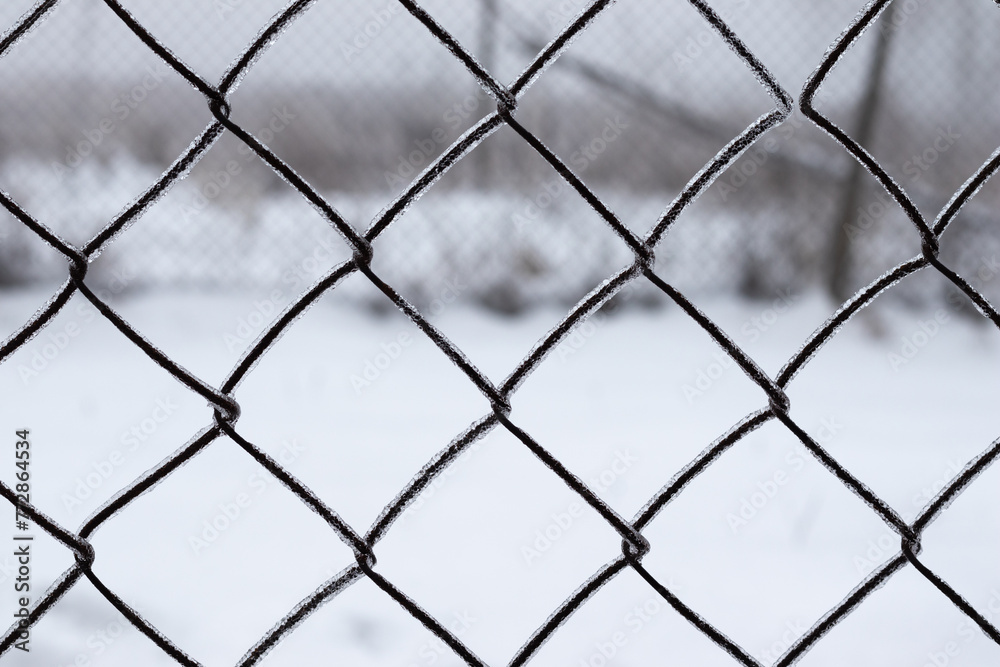 Close up view of frozen lattice fence Close up view of frozen lattice fence