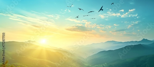 Blue sky, yellow and green mountains at the bright and there were flocks of birds flying in the sky, Ai generate photo