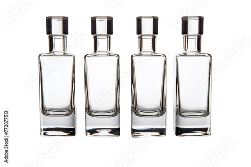 Three Empty Bottles With Black Tops on White Background. On a White or Clear Surface PNG Transparent Background..
