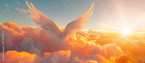 Abstract view of angel wings flying in the sky in front of majestic sunset, religion and salvation concepts photo