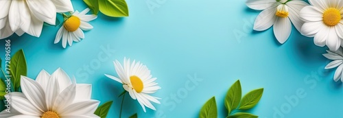 Floral banner with spring flowers on blue background with space for text photo