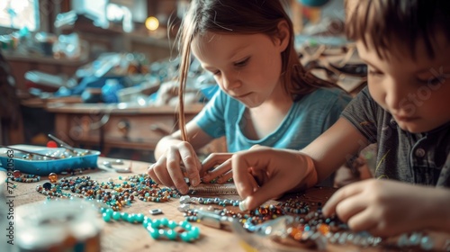 Concentrated Kids Crafting With Beads at Workshop Table © Tungbackground