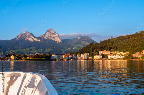 A view from the lake Urnersee or Lake Luzerne at Brunnen, a town in the political municipality of Ingenbohl, located on Lake Lucerne in the Schwyz district of the canton of Schwyz in Switzerland. photo