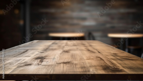 A close up of a empty wooden table in a cafe
