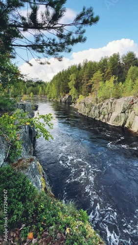 Canyon of the Nizhny Vyg river, near the Padun waterfall. A river gorge with rocks and greenery. Not far from the White Sea-Baltic Canal. Karelia, Russia 4K photo