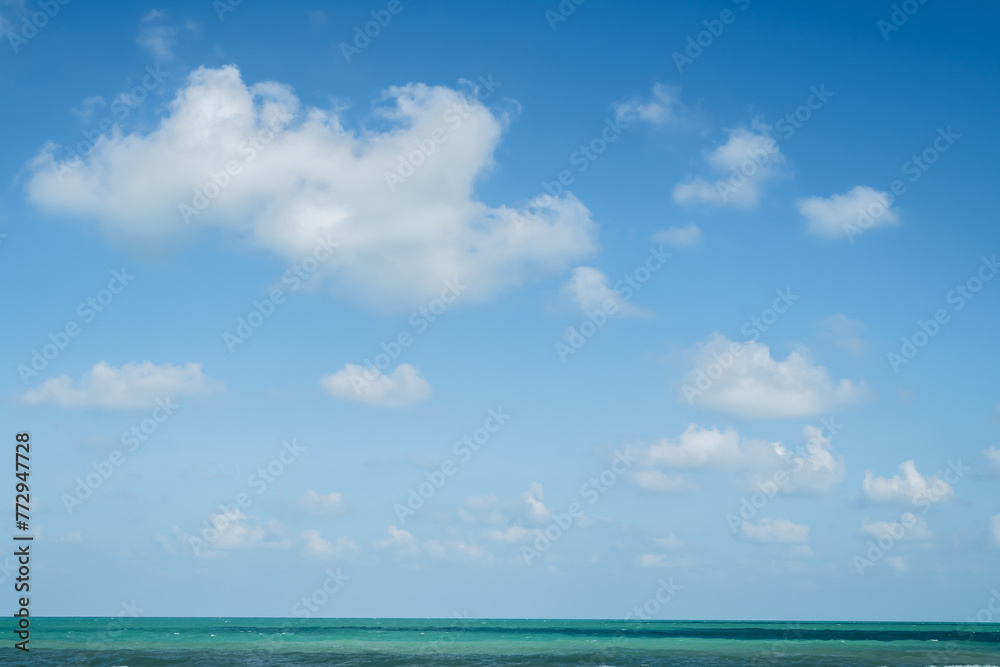 Tropical sea and wave against blue sky
