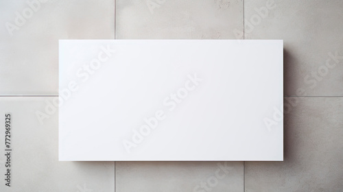 Blank square sign on concrete wall, white poster mockups with shadow on grey background