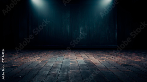 Dark room with wooden floors and spotlights photo
