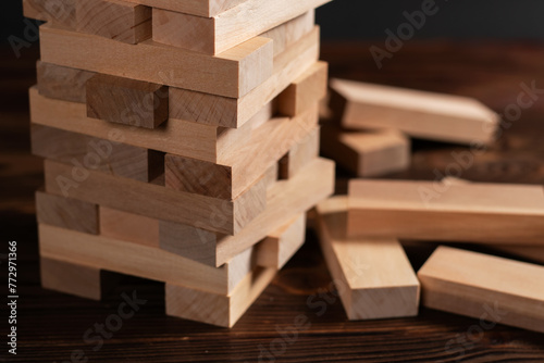 Obraz na plátně Blocks wood game with copy space, The tower from wooden blocks from the top view