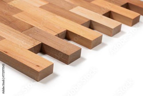 stacked wooden blocks on white. wood game close up. wooden background close up.