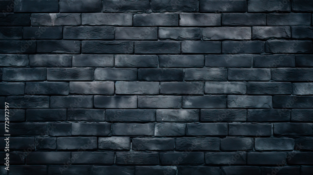 Close-up of brick wall against dark backdrop