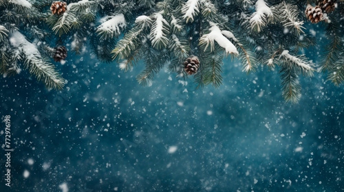 Pine tree close-up with falling snow © StockKing