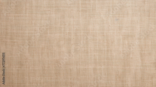 Close-up of textured tan fabric with small pattern