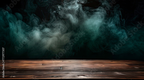 Smoke rising from wooden table in dark room photo