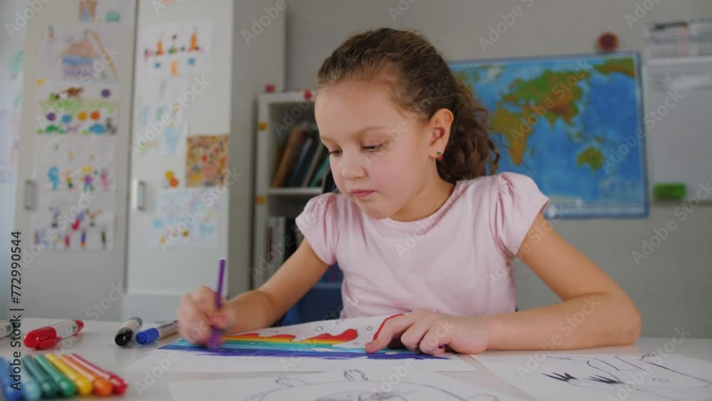 Little kid girl study at home, drawing picture by felt-tip markers pens, playing alone. Cute concentrated preschool child coloring picture, enjoy creative activity, children playtime education Little kid girl study at home, drawing picture by felt-tip markers pens, playing alone. Cute concentrated preschool child coloring picture, enjoy creative activity, children playtime education