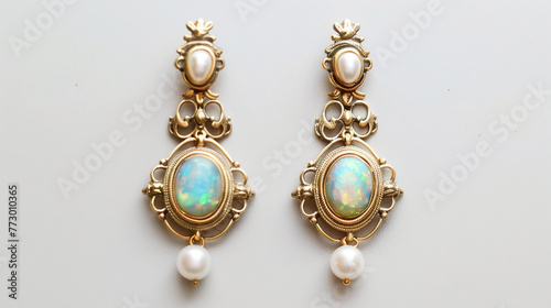 earrings with diamonds isolated in sky blue