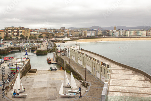  Embankment of the port of San Sebastian, Spain. View of Concha Beach © Victoriia