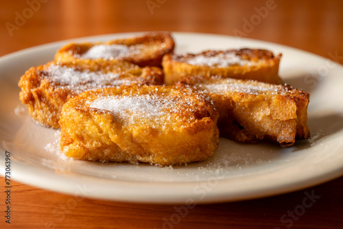 "Torrijas" are a typical sweet in Spain during Easter, consisting of fried bread with milk, egg, cinnamon and sugar, sometimes also honey