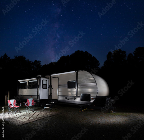 Milky Way over a camper trailer