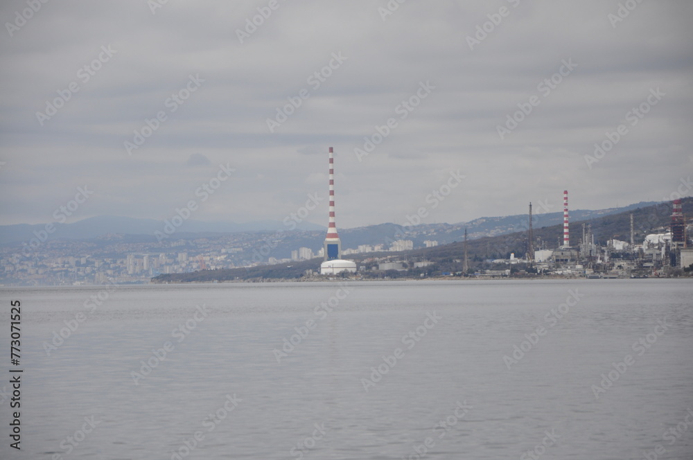 Urinj, Croatia, on October 18, 2023. The INA Industrija Nafte d.d. oil refinery on the shores of the Adriatic sea.Thermal power plant and oil refinery near Rijeka, Croatia