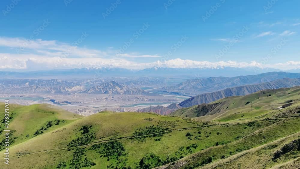 Toguz-Toro pass in Jalal-Abad region in western Kyrgyzstan. The Tien Shan and Pamir mountain systems. The highlands. View of the serpentine from the pass. 4К Toguz-Toro pass in Jalal-Abad region in western Kyrgyzstan. The Tien Shan and Pamir mountain systems. The highlands. View of the serpentine from the pass. 4К