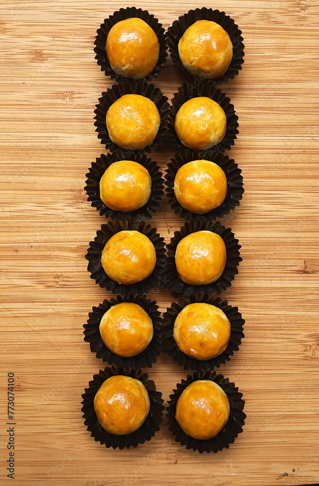 Nastar, from Ananas Taart, basically famous indonesian cake, originally from Holland. A cake favored by the Dutch with European pies or tarts usually filled with blueberries and apples.
